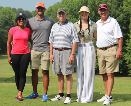 Residents and faculty on the golf course