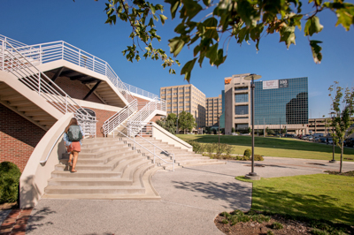 Student ascending stairs at UTHSC campus.