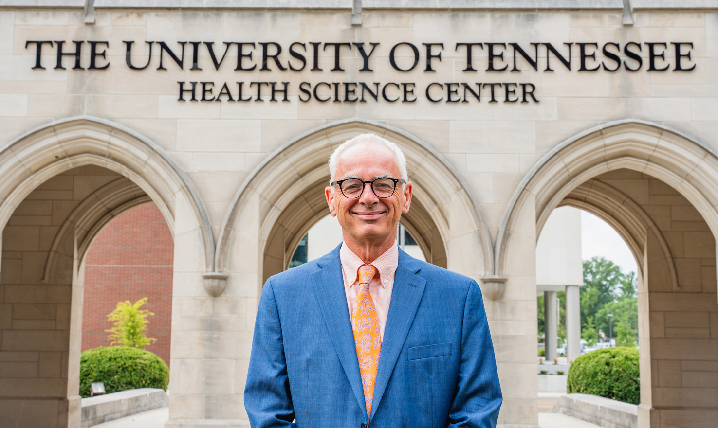 Chancellor Buckley in front of the UTHSC campus.