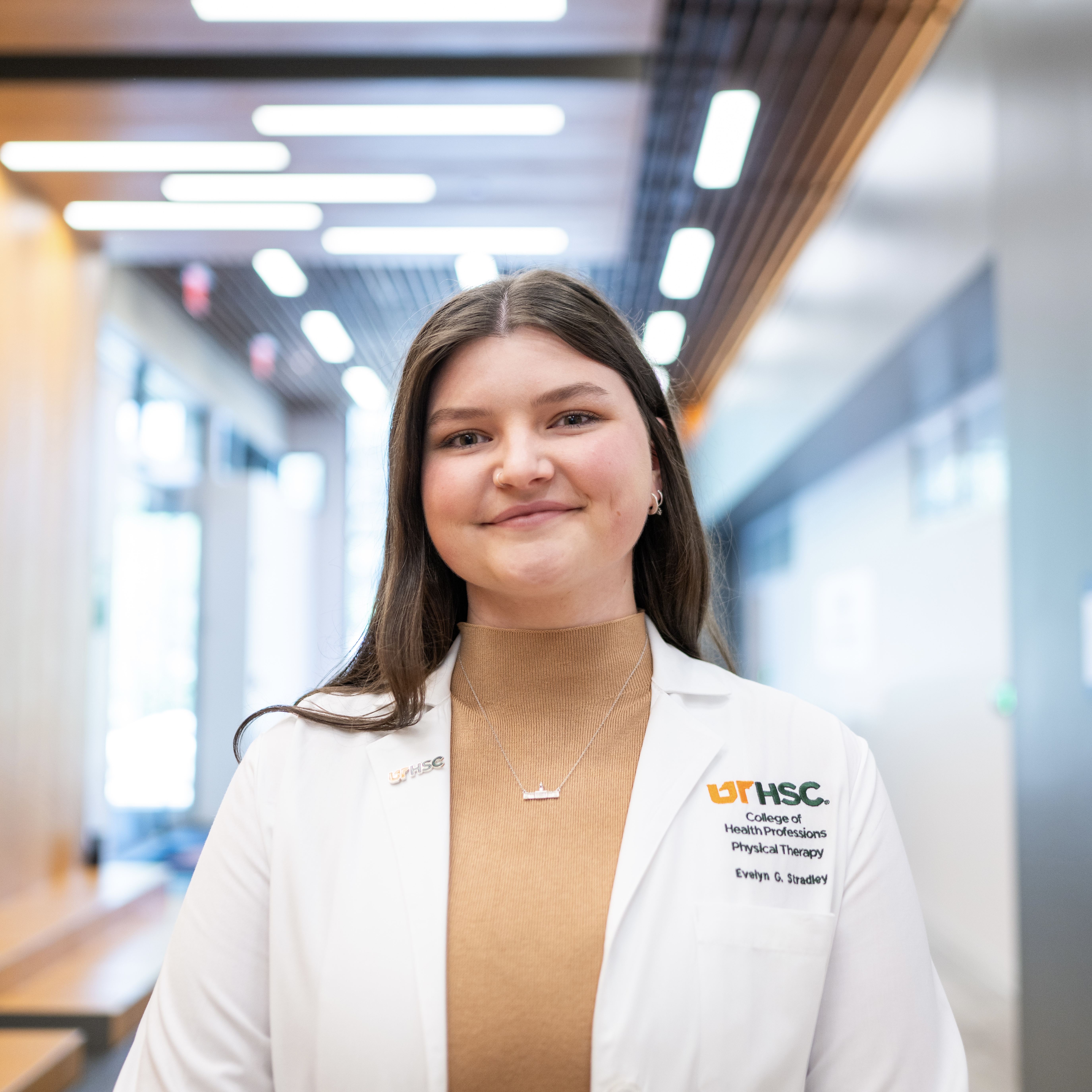 Evy Stradley in her white coat.