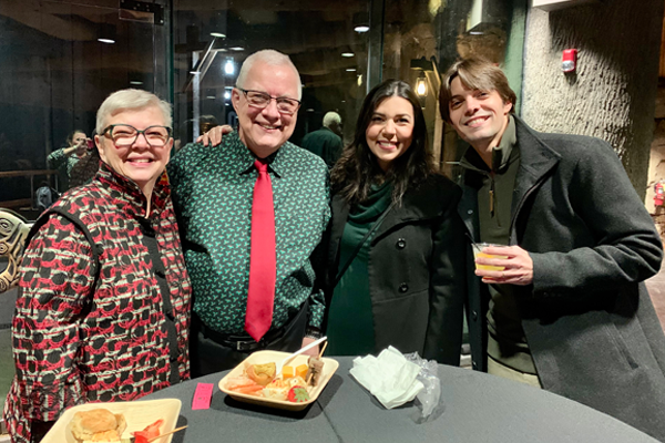 4 faculty at the holiday party