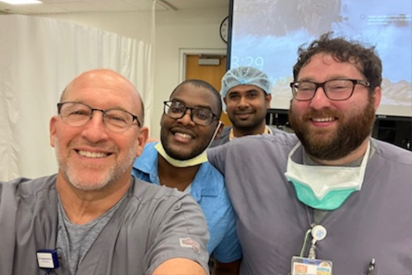 Indoor scene of faculty in scrubs