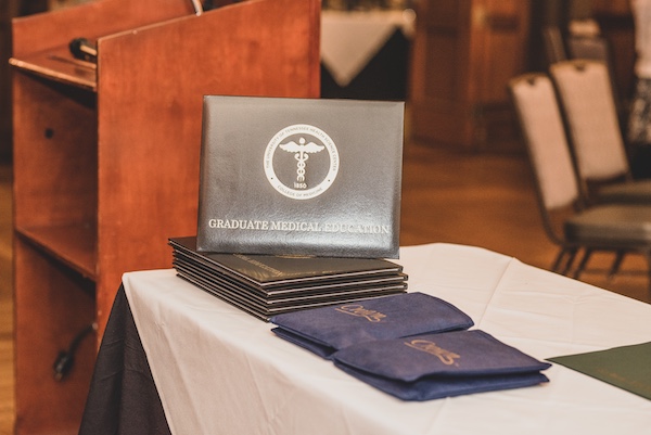 Graduation certificates on a table