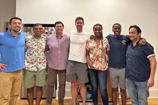 Group of fellows arm in arm