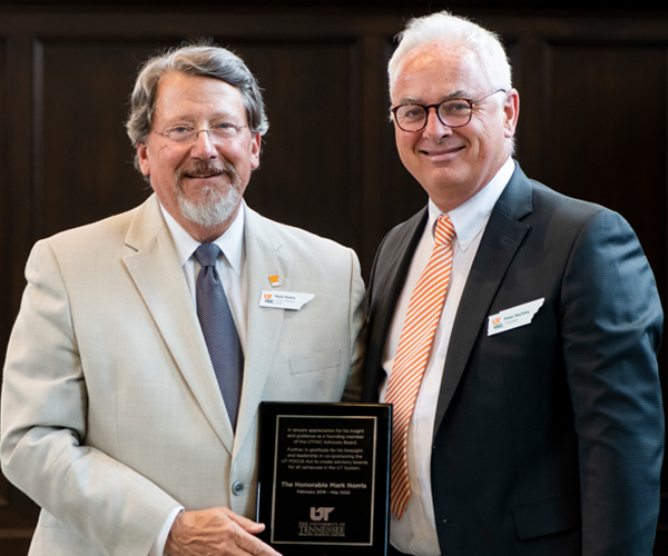 Judge Mark Norris accepting an appreciation plaque from Chancellor Buckley.