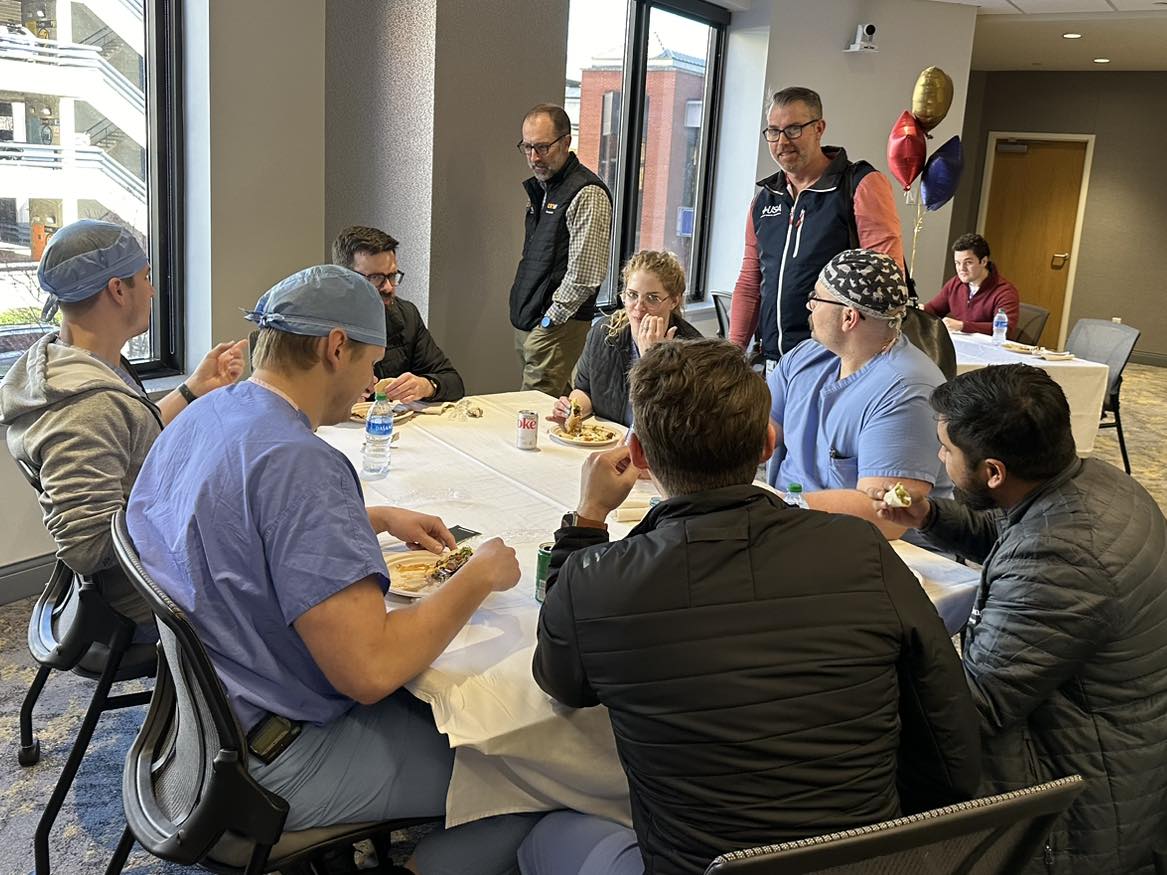 Surgery Chair, Dr. Ben Dart, and Surgery Residency Director thanking several Surgery Residents including Drs. Levin Fairchild, Jordan Raine, Chace Hicks, Alex Urevick, Hunter Parmer, and Catherine Valli 