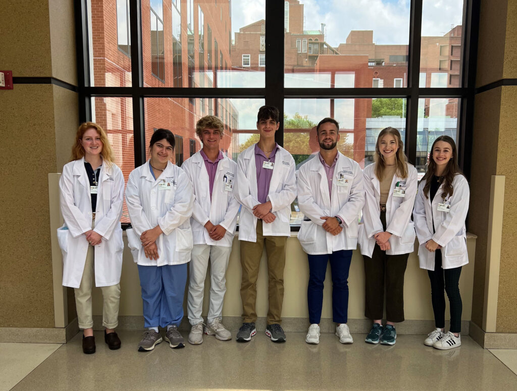 Future Docs student participants in white coats