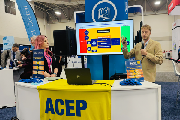 Residents at the ACEP table in a conference room