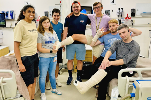 Group of residents and the program manager in a hospital room