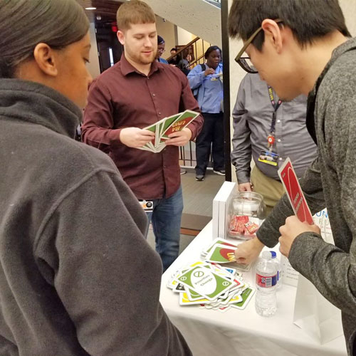 People playing BA Uno