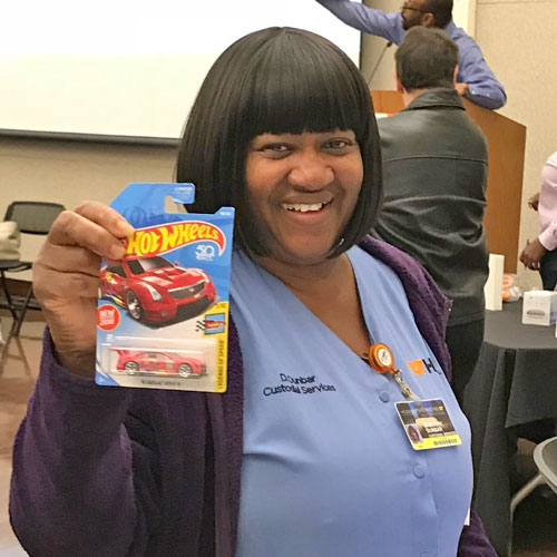 Lady who won a car (actually a Hot Wheel)