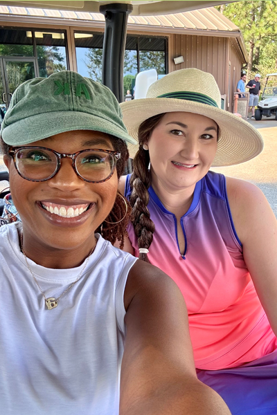 Female residents riding in a golf course