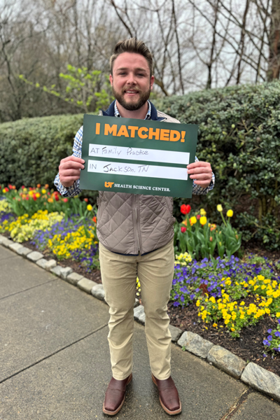 Resident with a matched sign for Jackson Family Medicine