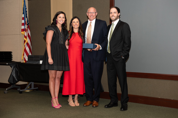 Residents with program director at graduation