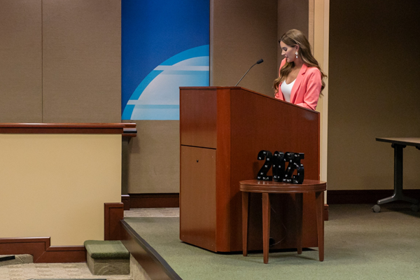Faculty on stage at graduation