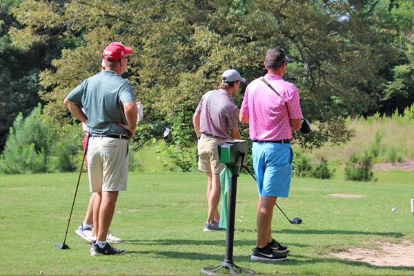 Male residents on a golf course