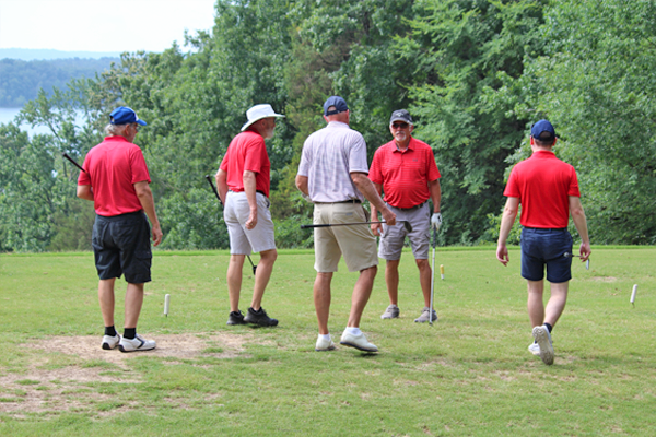 Male residents on a golf course
