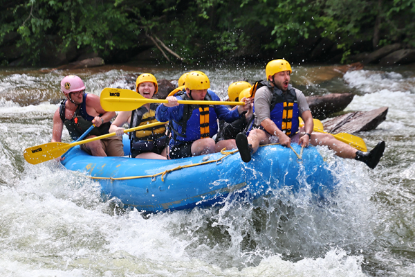 Residents rafting on a river