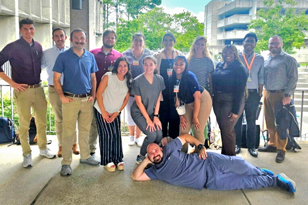 Group photo of incoming residents taken on a patio at UTHSC