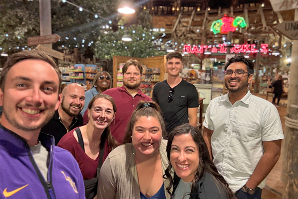 Group photo of incoming residents taken inside the Bass Pro pyramid
