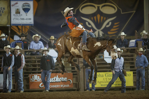 guy on a bucking horse