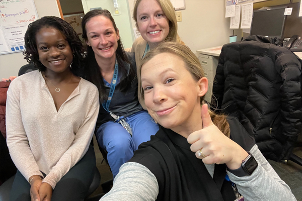 Four female residents in an office