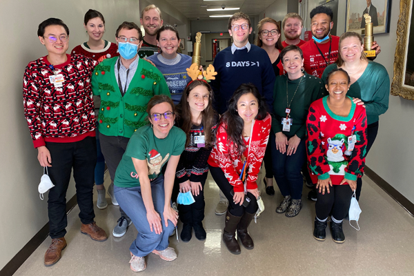 Residents dressing in holiday attire in a hallway