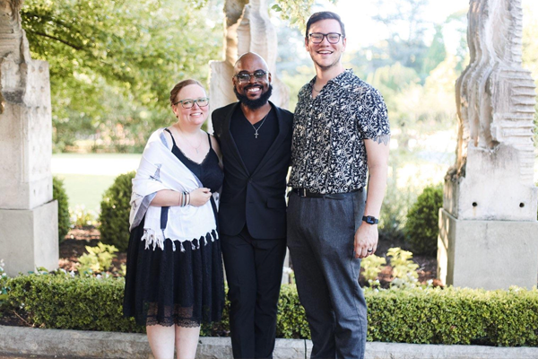 Three fellows in an outdoor park setting