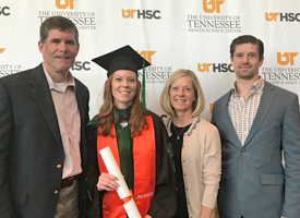 resident with her family at graduation