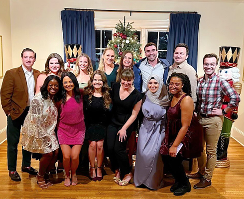 Residents dressed up for an indoor Christmas party