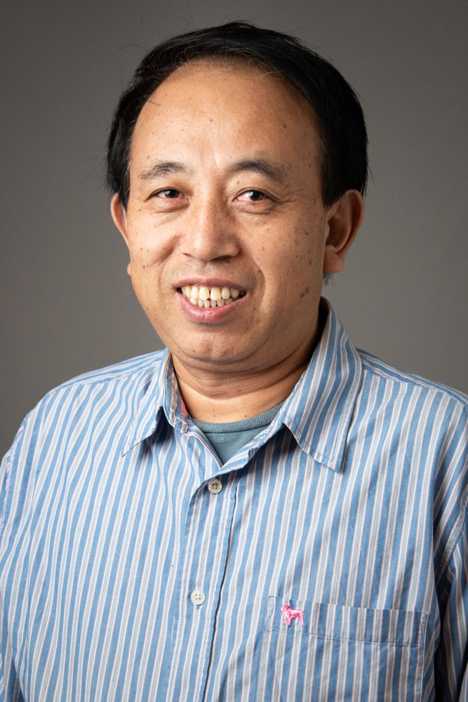 Dr. Junming Yue