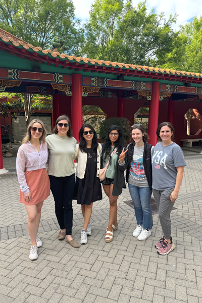 Female fellows standing before former Panda exhibit at the Memphis Zoo