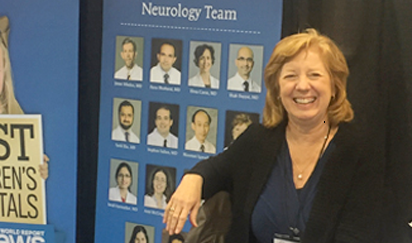 Faculty member at a Le Bonheur Neuroscienc Institute booth