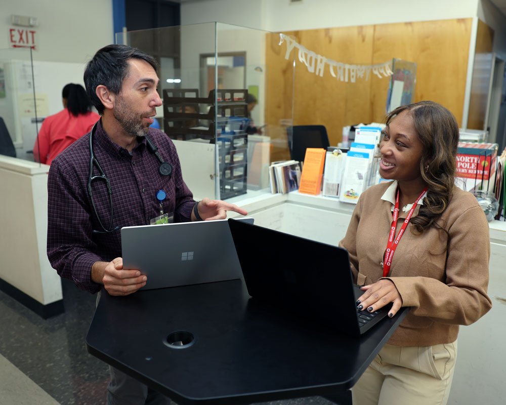 Fellow with preceptors in Christ Community Clinic