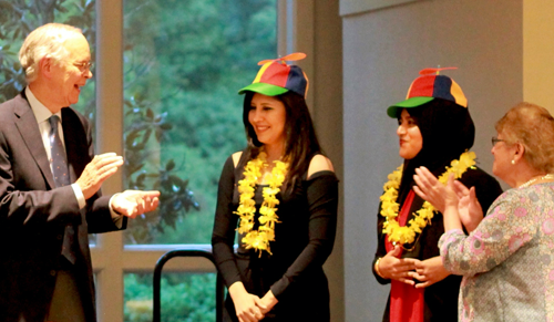 Two fellows and two faculty at graduation