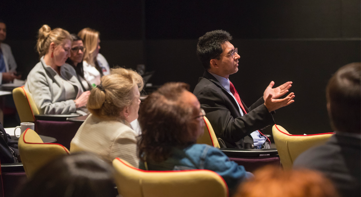 Attendee speaking from the audience