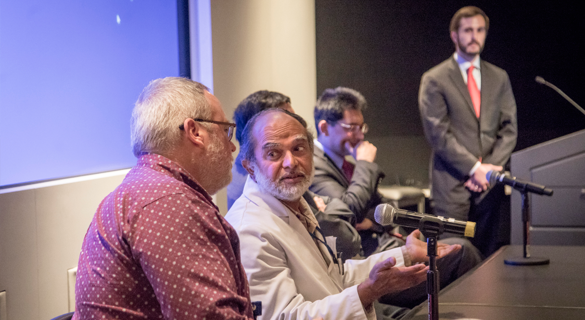 Presenters discussing a presentation