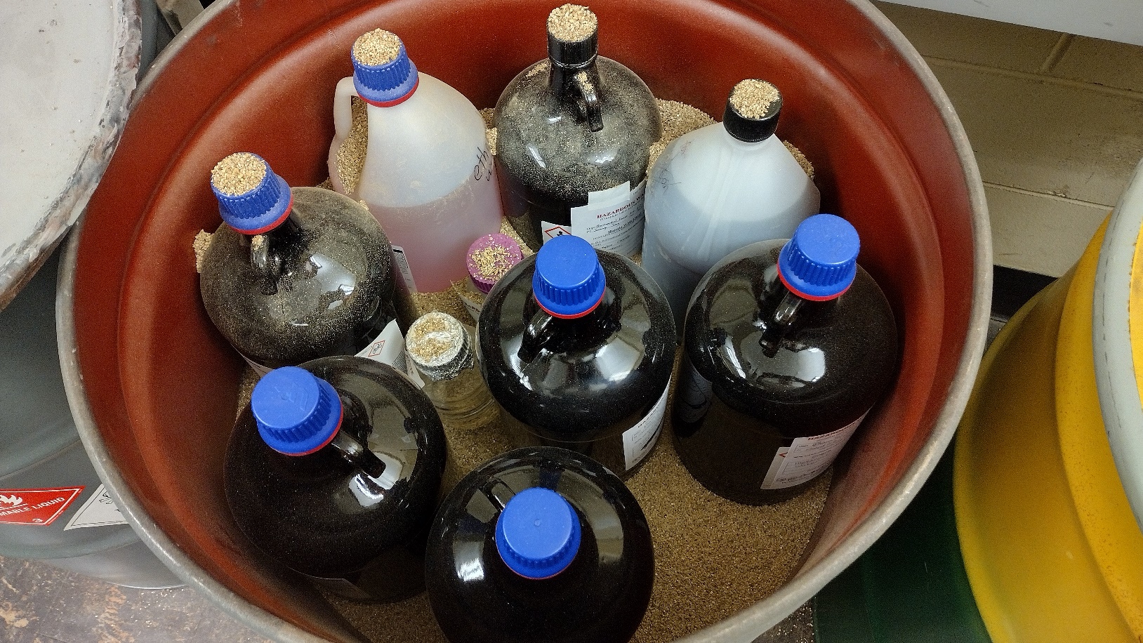 Bottled waste packed in a drum.