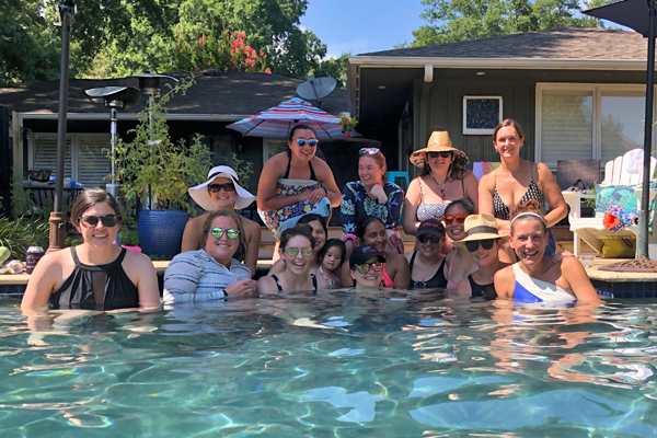 Group photo of female residents in a swimming pool