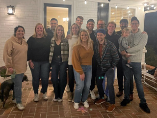 Group photo with Dr. Saidian on a porch