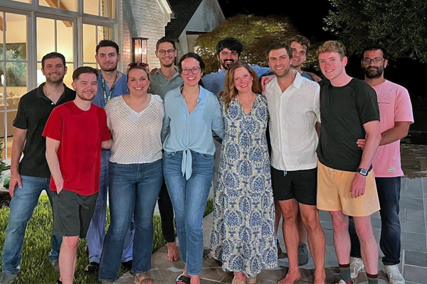Group photo outside a house