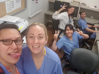 Group of smiling residents in a hospital setting
