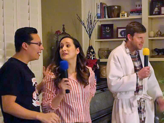 Residents singing karaoke at a Christmas party